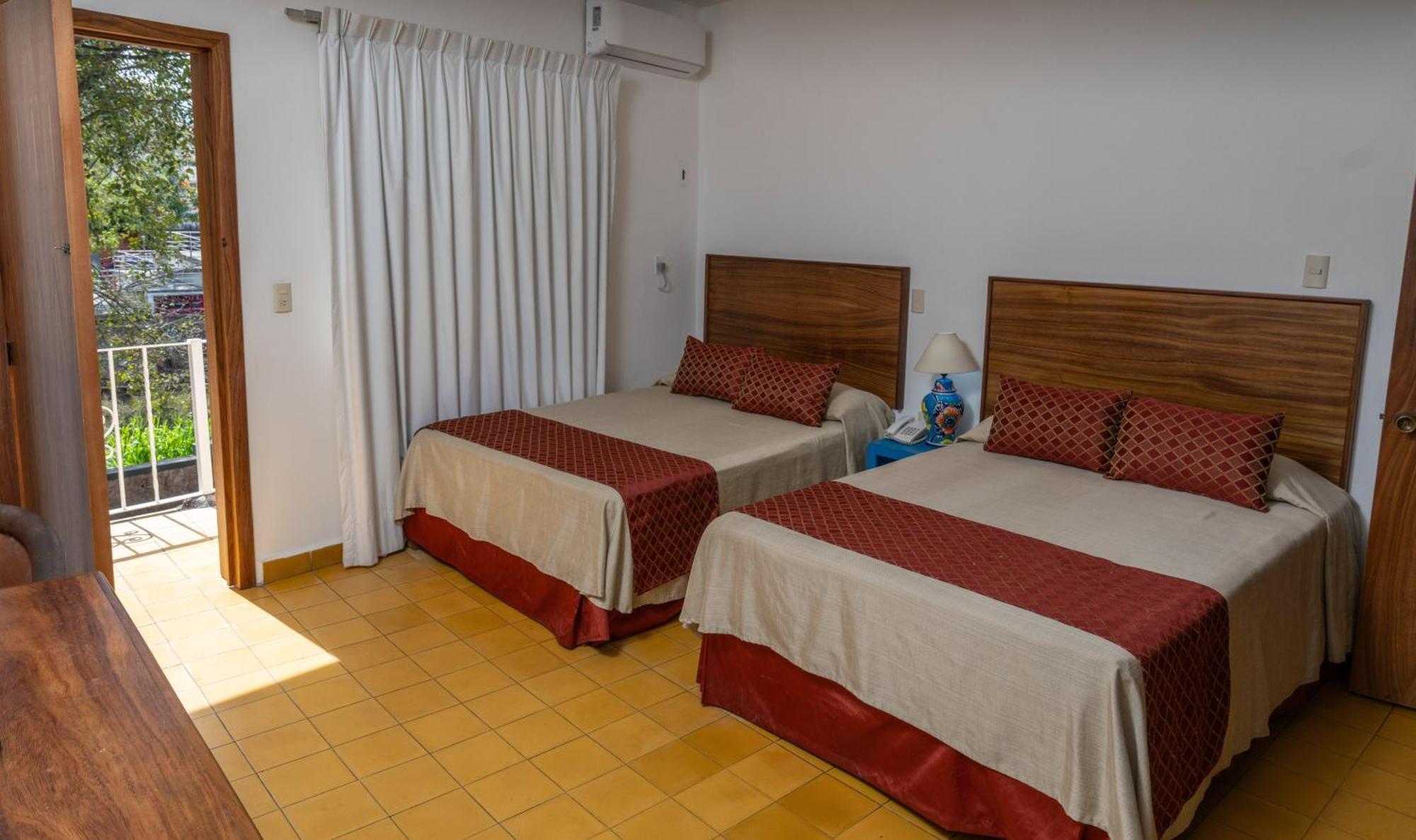 Hotel Encino Malecon Centro بويرتو فالارتا الغرفة الصورة