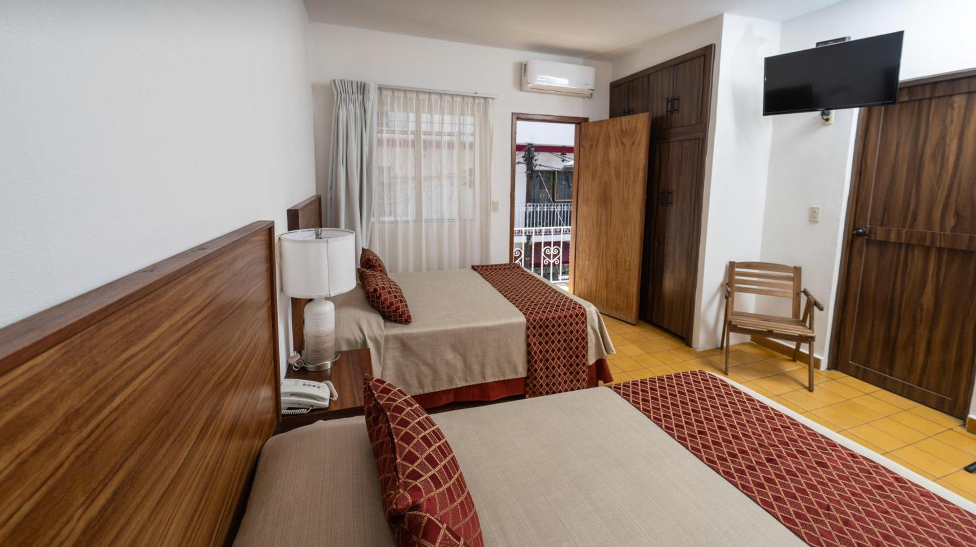 Hotel Encino Malecon Centro بويرتو فالارتا الغرفة الصورة
