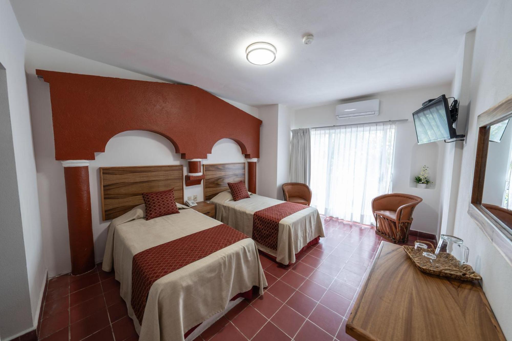 Hotel Encino Malecon Centro بويرتو فالارتا الغرفة الصورة