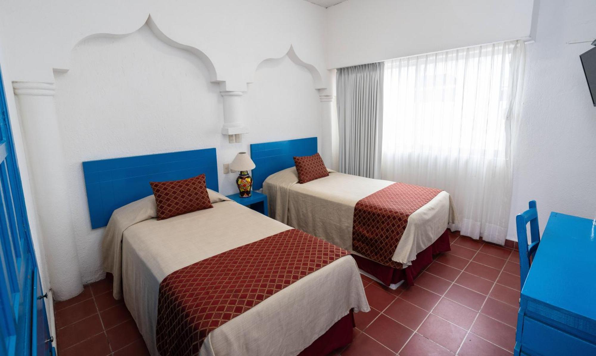 Hotel Encino Malecon Centro بويرتو فالارتا الغرفة الصورة